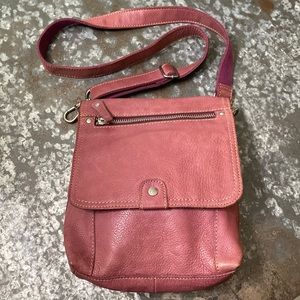 Fossil crossbody plum colored leather bag.